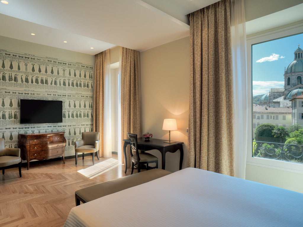 An Executive double room at Palace Hotel Como