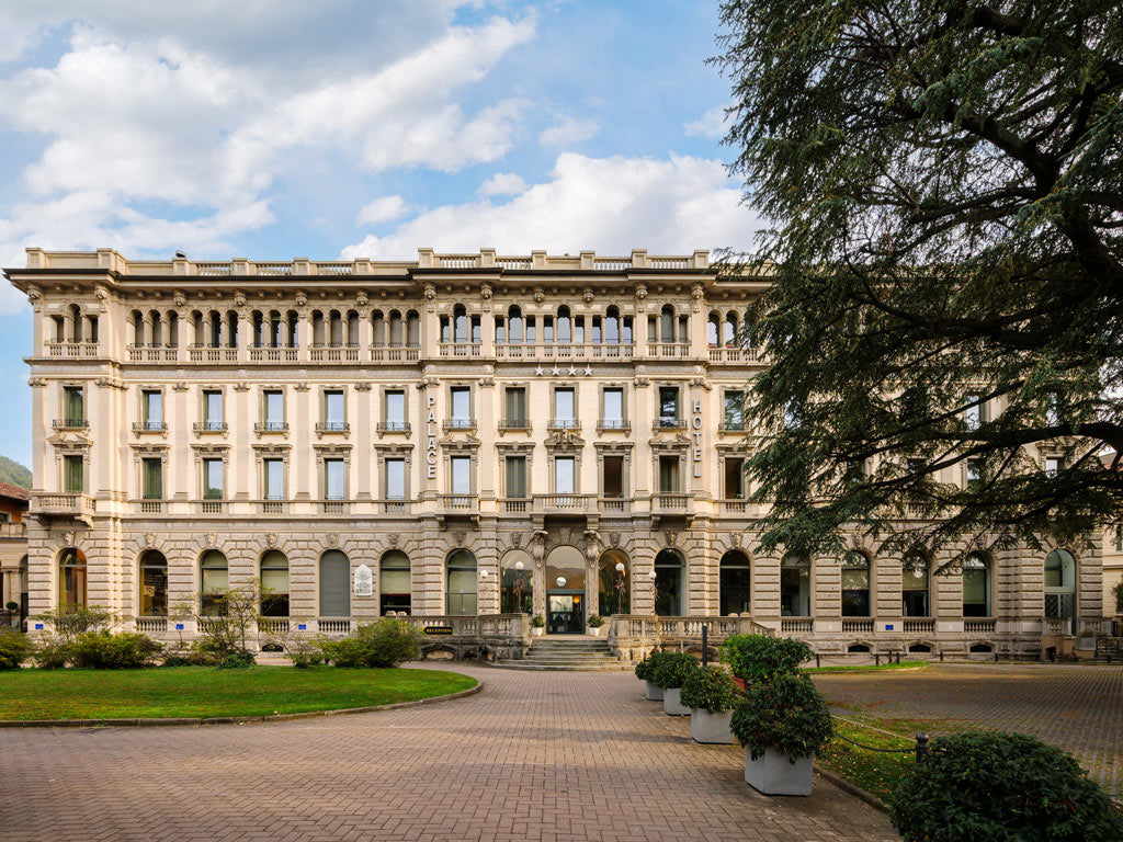 The facade and garden of Palace Hotel Como