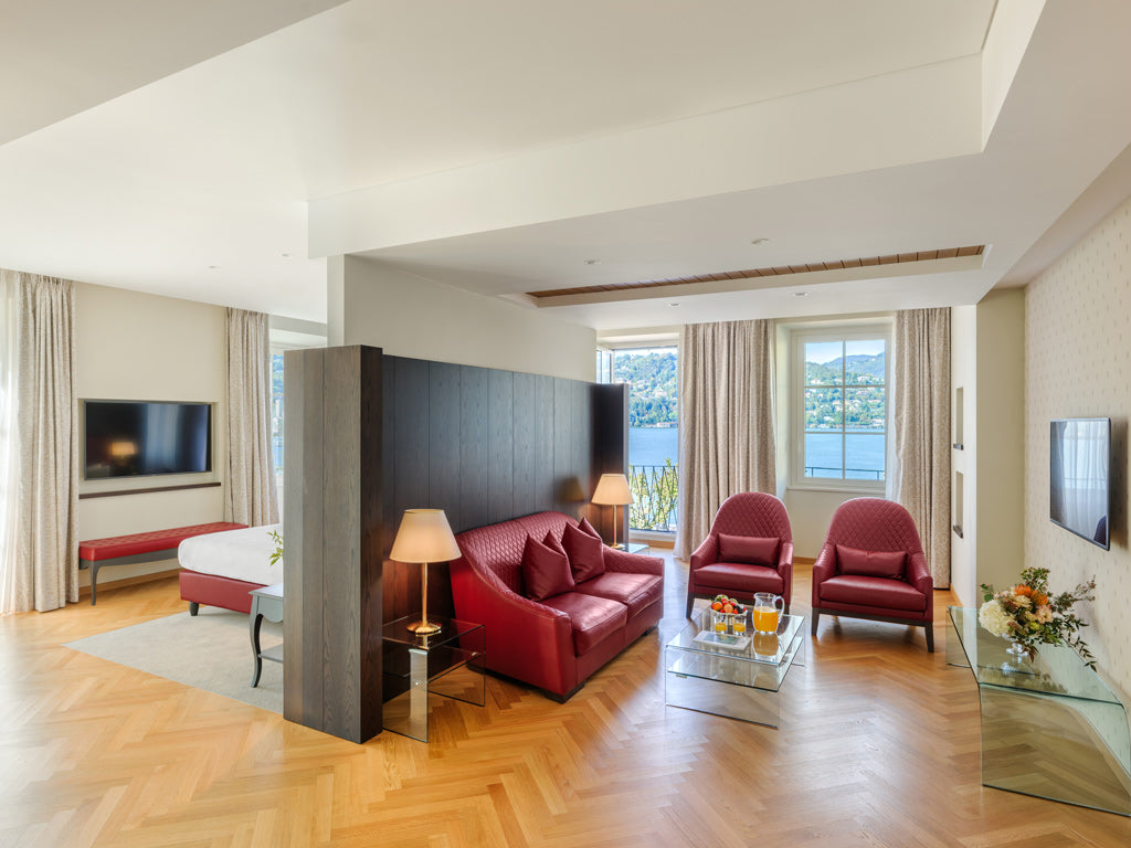 The sitting area of a Suite at Palace Hotel Como