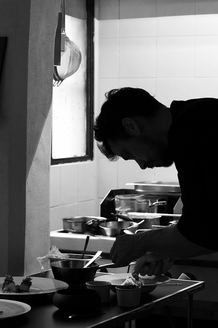 The chef at work in the kitchen at Comi 107