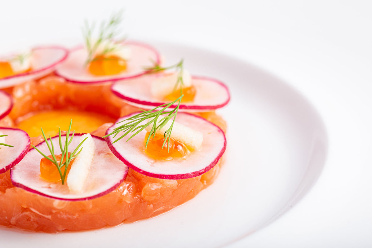 Fish tartare with radish at Comi 107