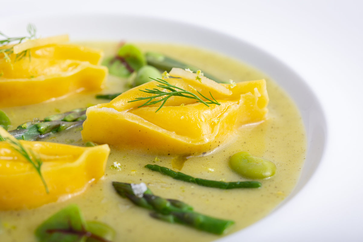 Ravioli with asparagus at Comi 107