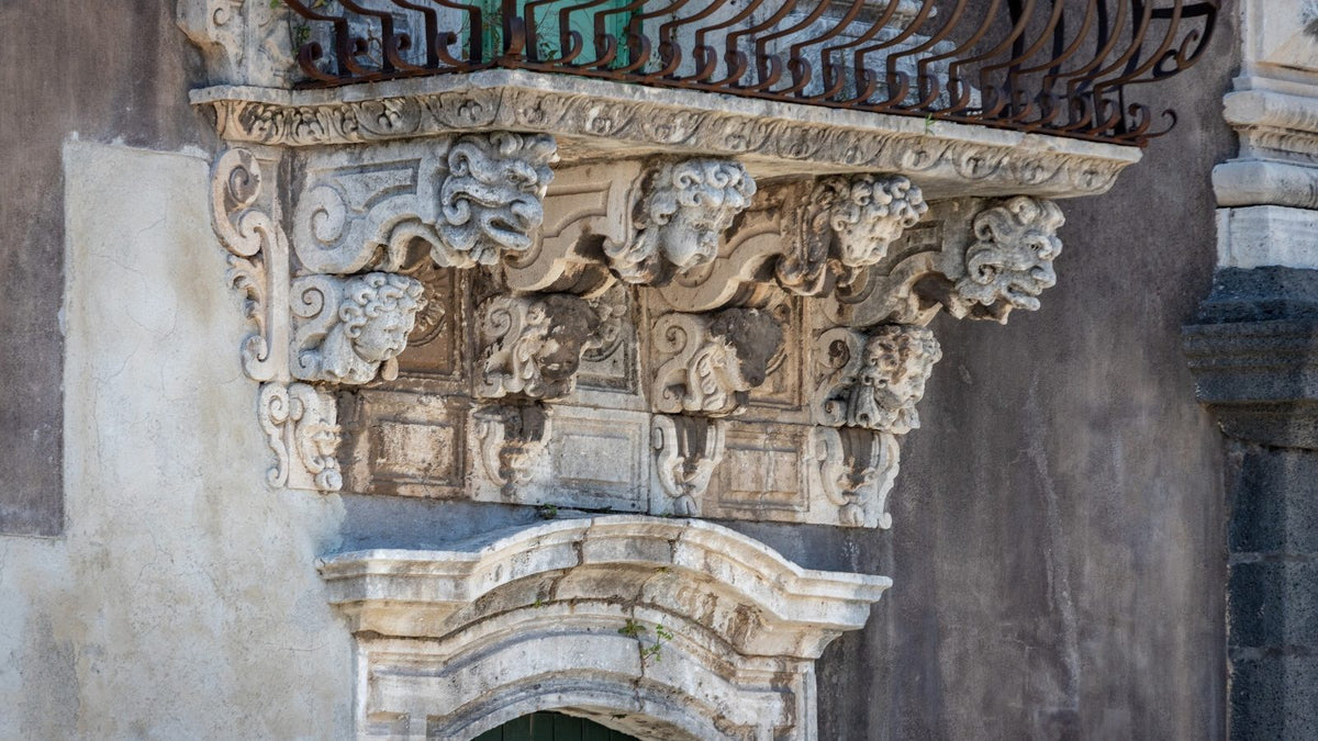 Carved baroque balcony of the Monastero dei Benedettini