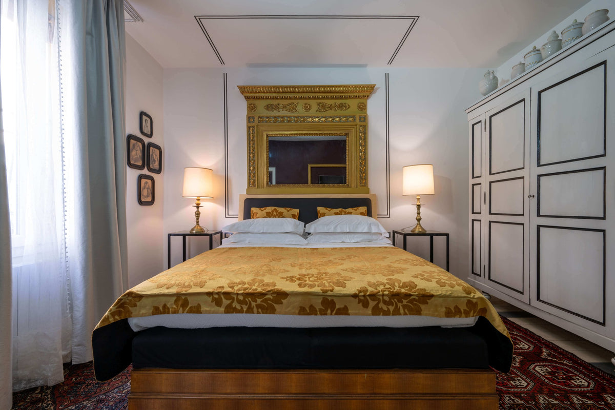 The Strength (Forza) room at Casa Bertagni, a boutique hotel in Bologna