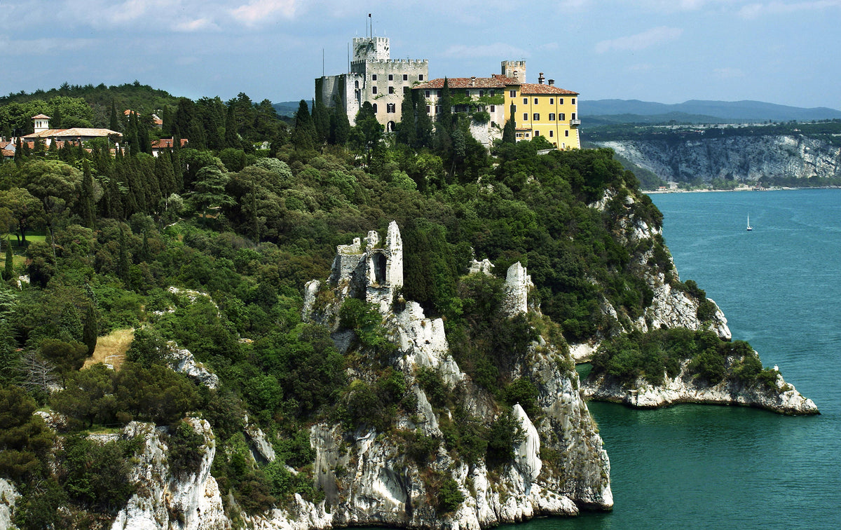 Duino Castle and the old castle ruins on the cliffs