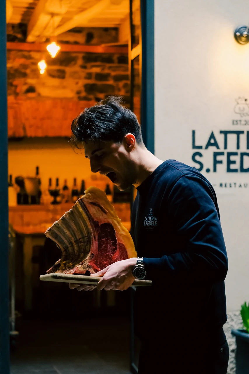 Presenting a rib of beef at Latteria San Fedele