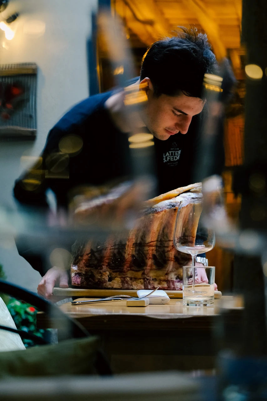 Carving beef at Latteria San Fedele