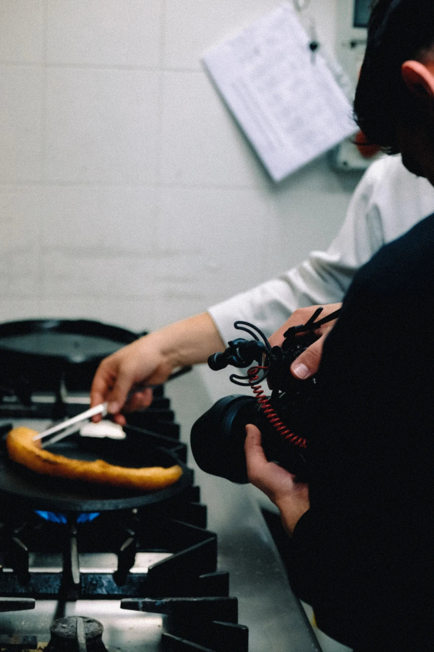 Cooking on the stove at Latteria San Fedele