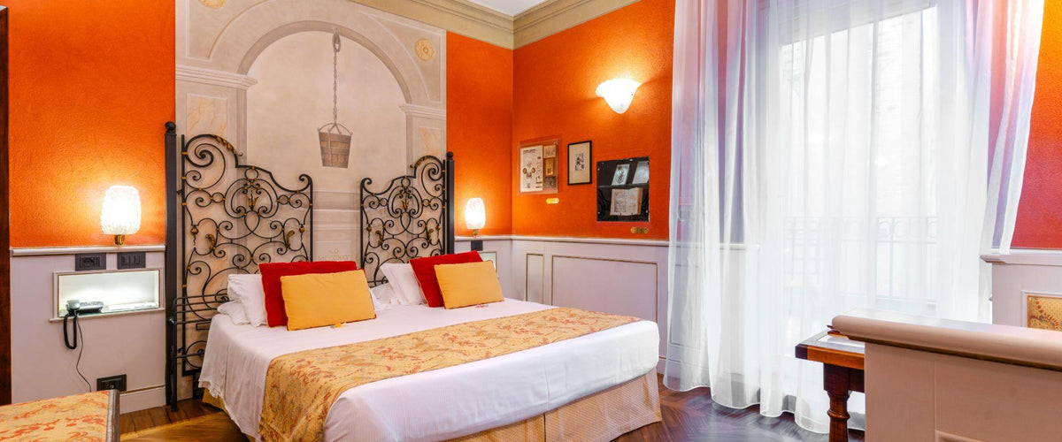 A Deluxe room with terrace at Art Hotel Commercianti