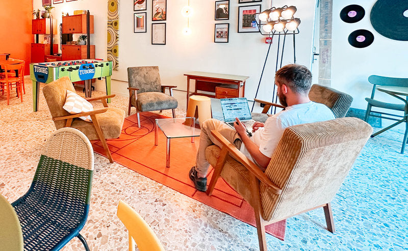 The informal coworking space at Ostello Bello Bologna