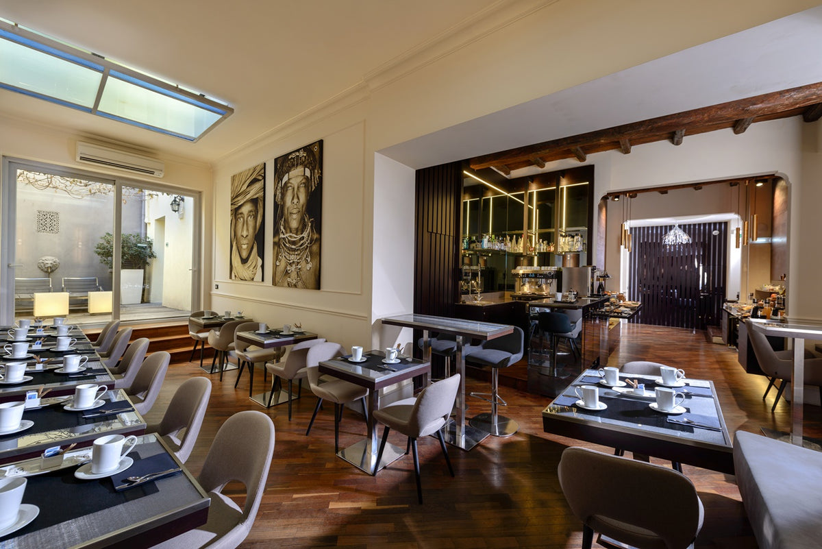 The breakfast room at Hotel Metropolitan, Bologna