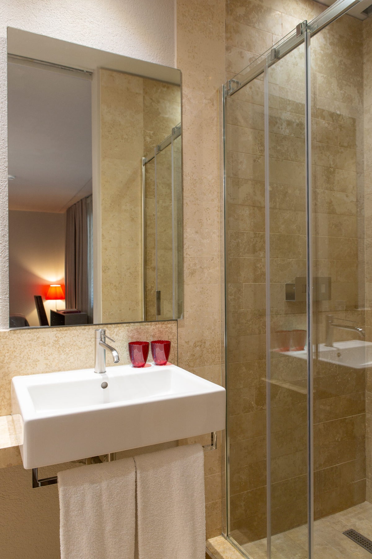 A Superior room bathroom at Posta Design Hotel