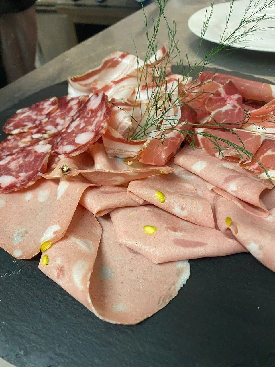 A board of cured meats at Ciàpa Fiaa
