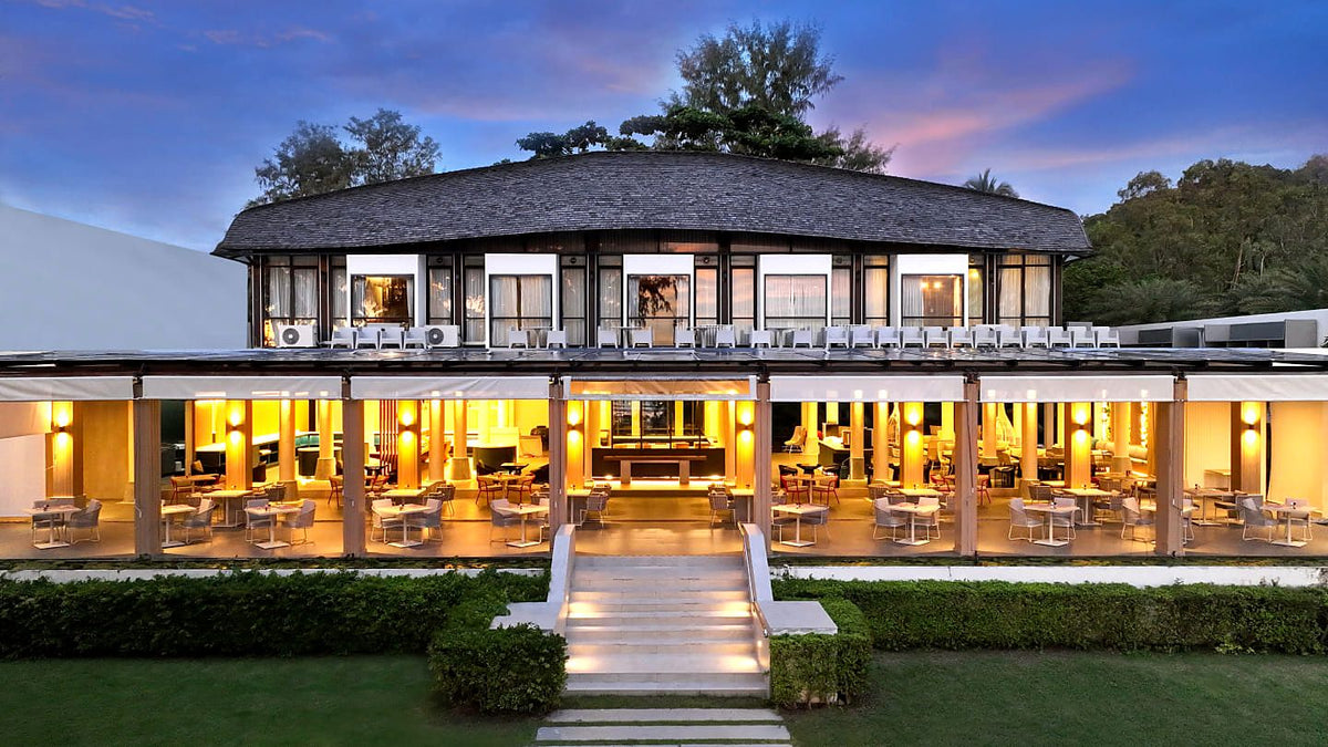 Buafah Restaurant lit up at dusk at Twin Lotus Resort, Klong Dao