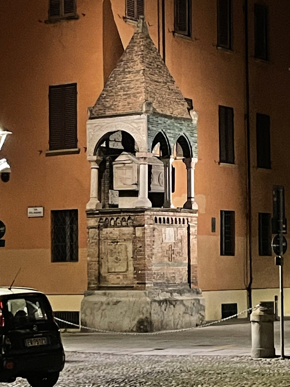 A medieval Glossators' tomb on a Bologna street corner