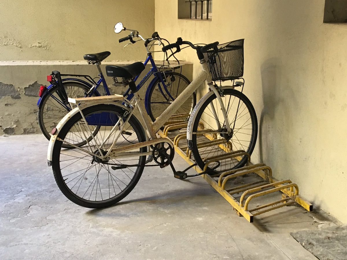 Bicycles parked in a Bologna courtyard