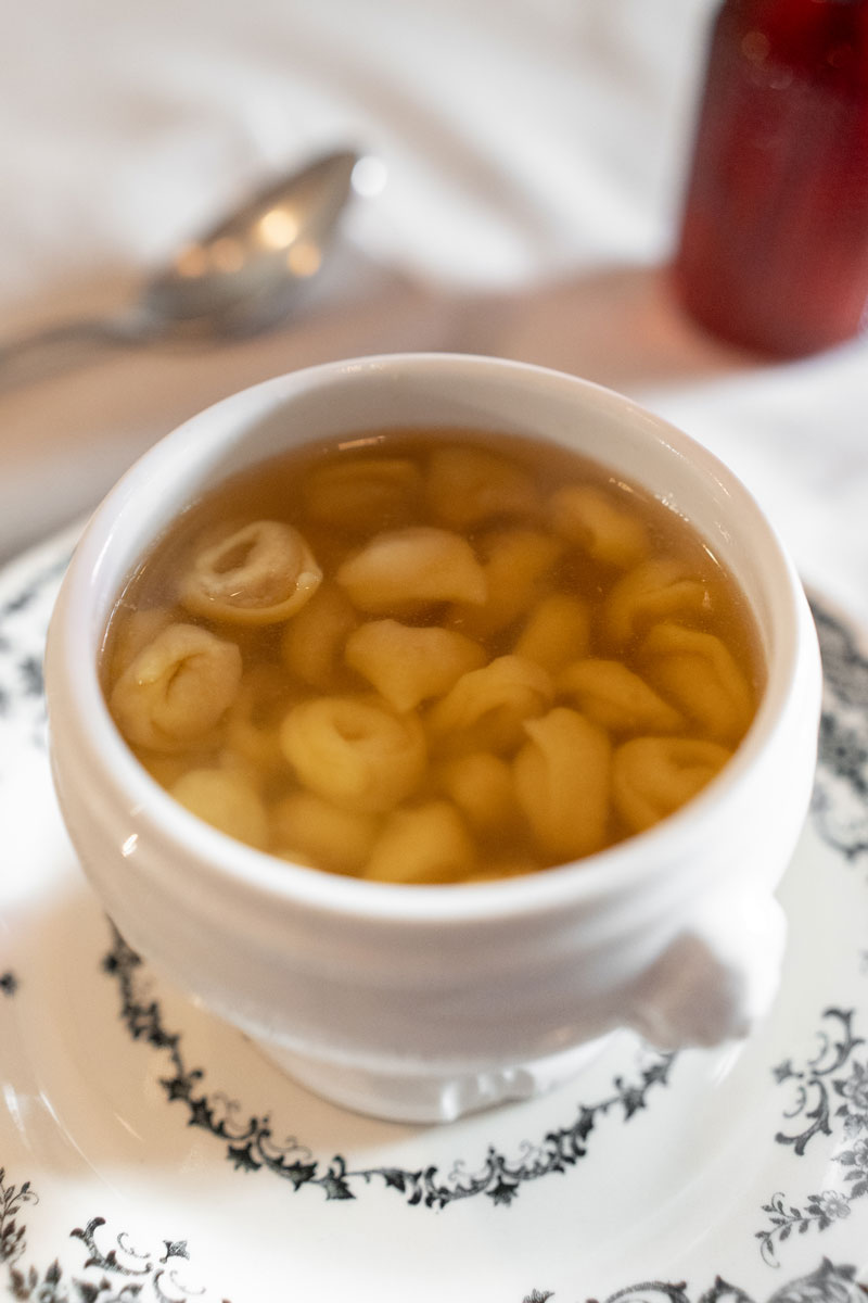 A bowl of tortellini in broth at La Montanara