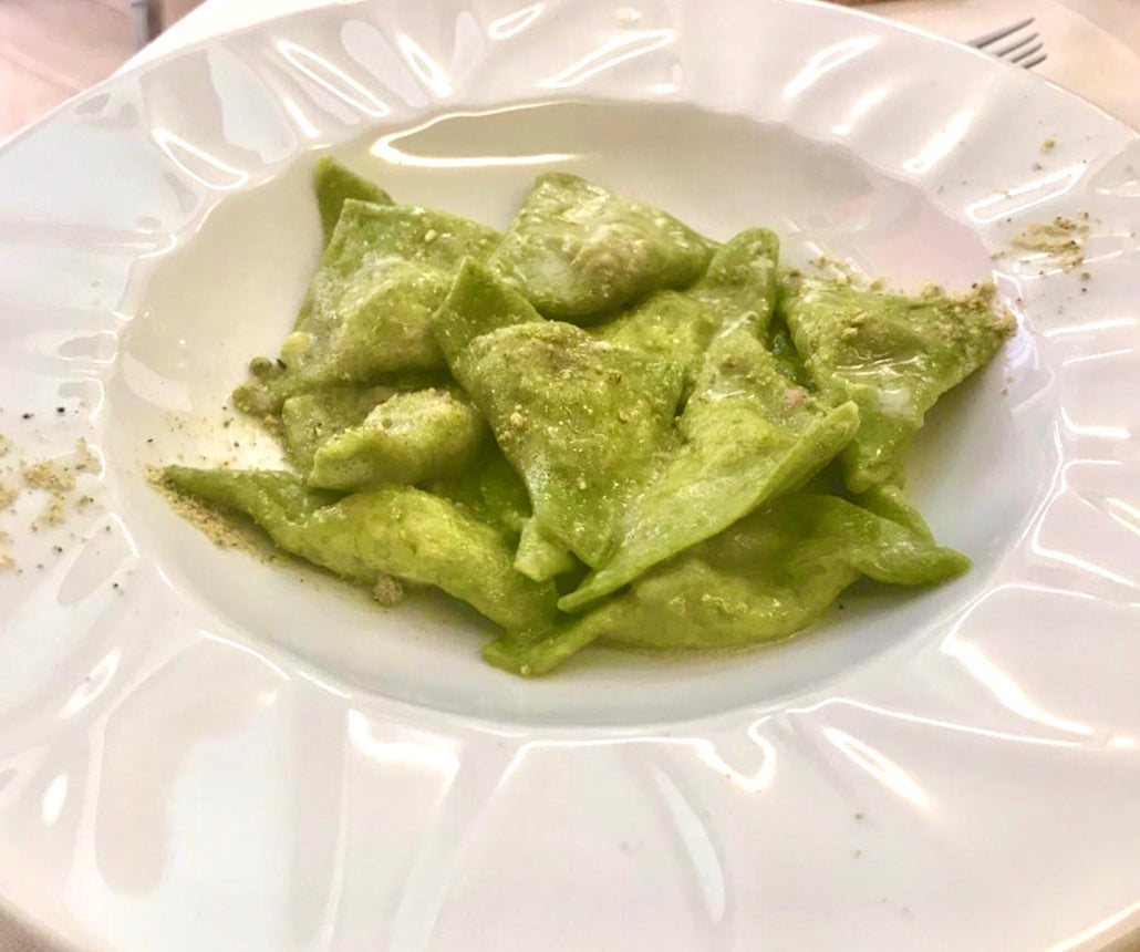 A plate of green raviolini at Nonna Gigia