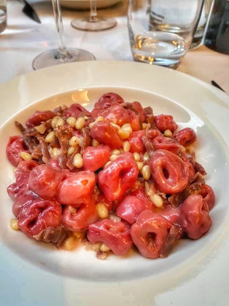 Pink tortellini with pine nuts at Nonna Gigia