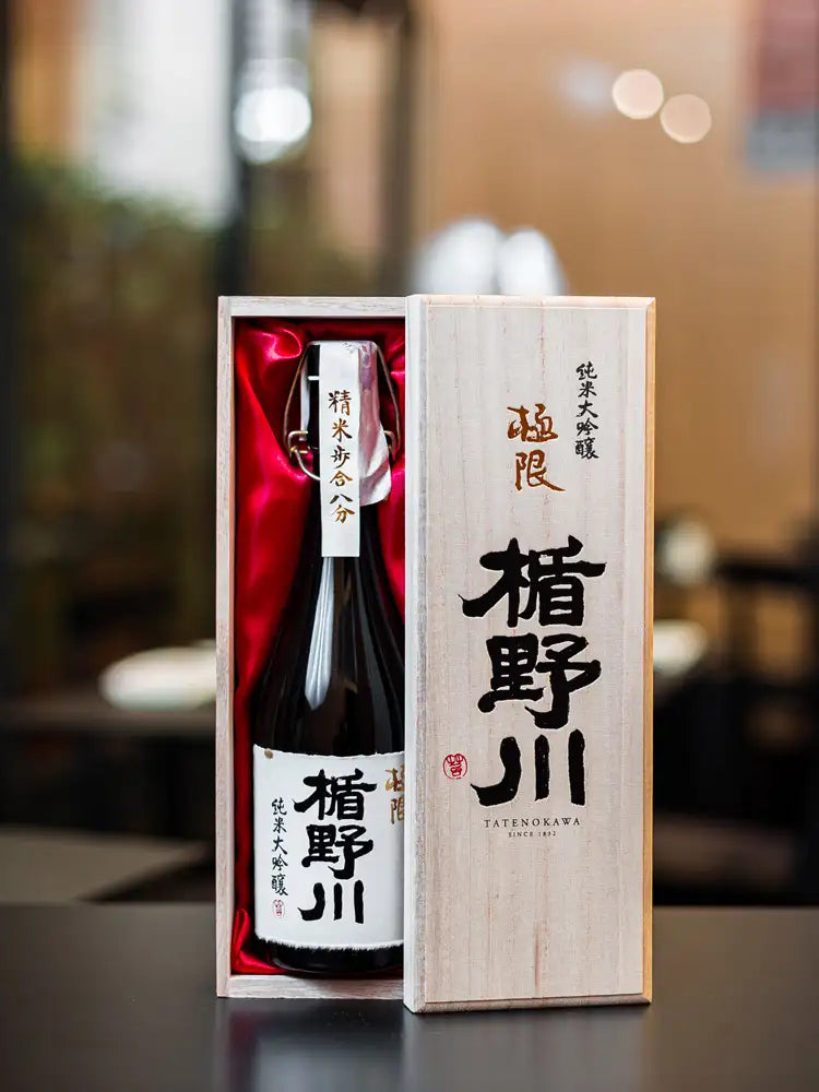 A bottle of Japanese sake in its wooden box at Seta