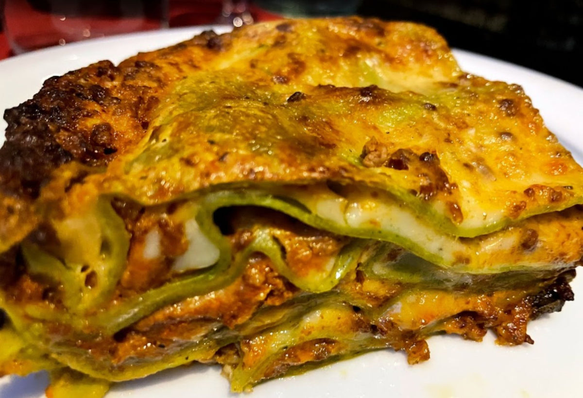 A slice of green lasagne at Trattoria Trebbi