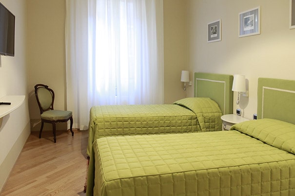 Single beds in the San Petronio Room at Casa Isolani