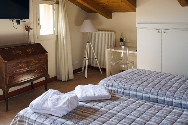 Double bedroom in the Santo Stefano Room at Casa Isolani