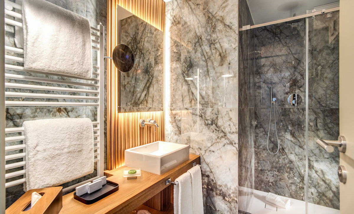 The bathroom of the Business Suite at DBH Duomo Boutique Hotel