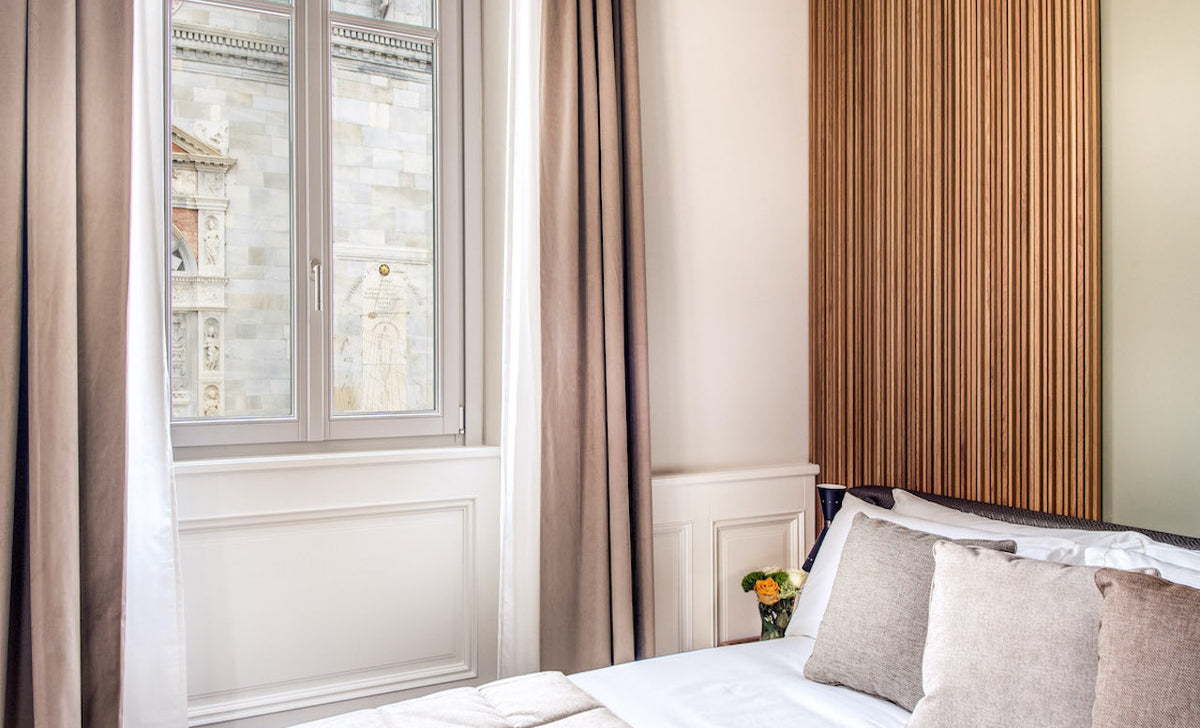 An Executive double room at DBH Duomo Boutique Hotel