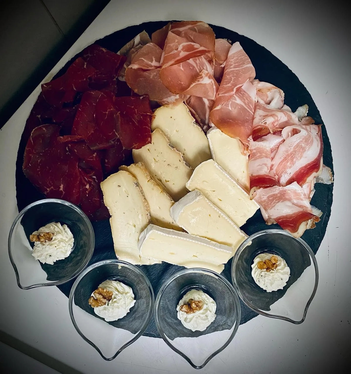 A board of cured meats and cheese at Ciàpa Fiaa