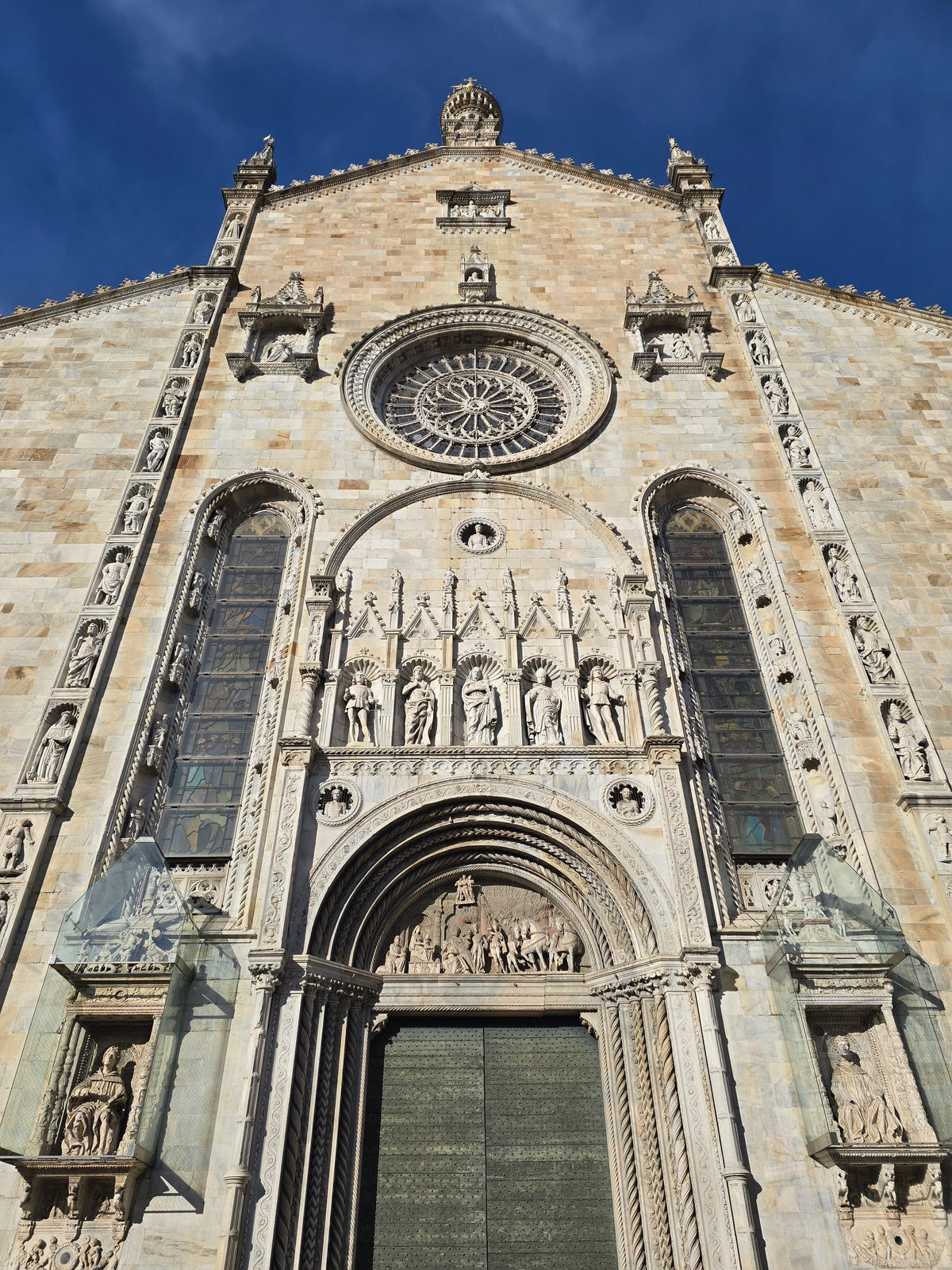 The Gothic portal and rose window of the cathedral