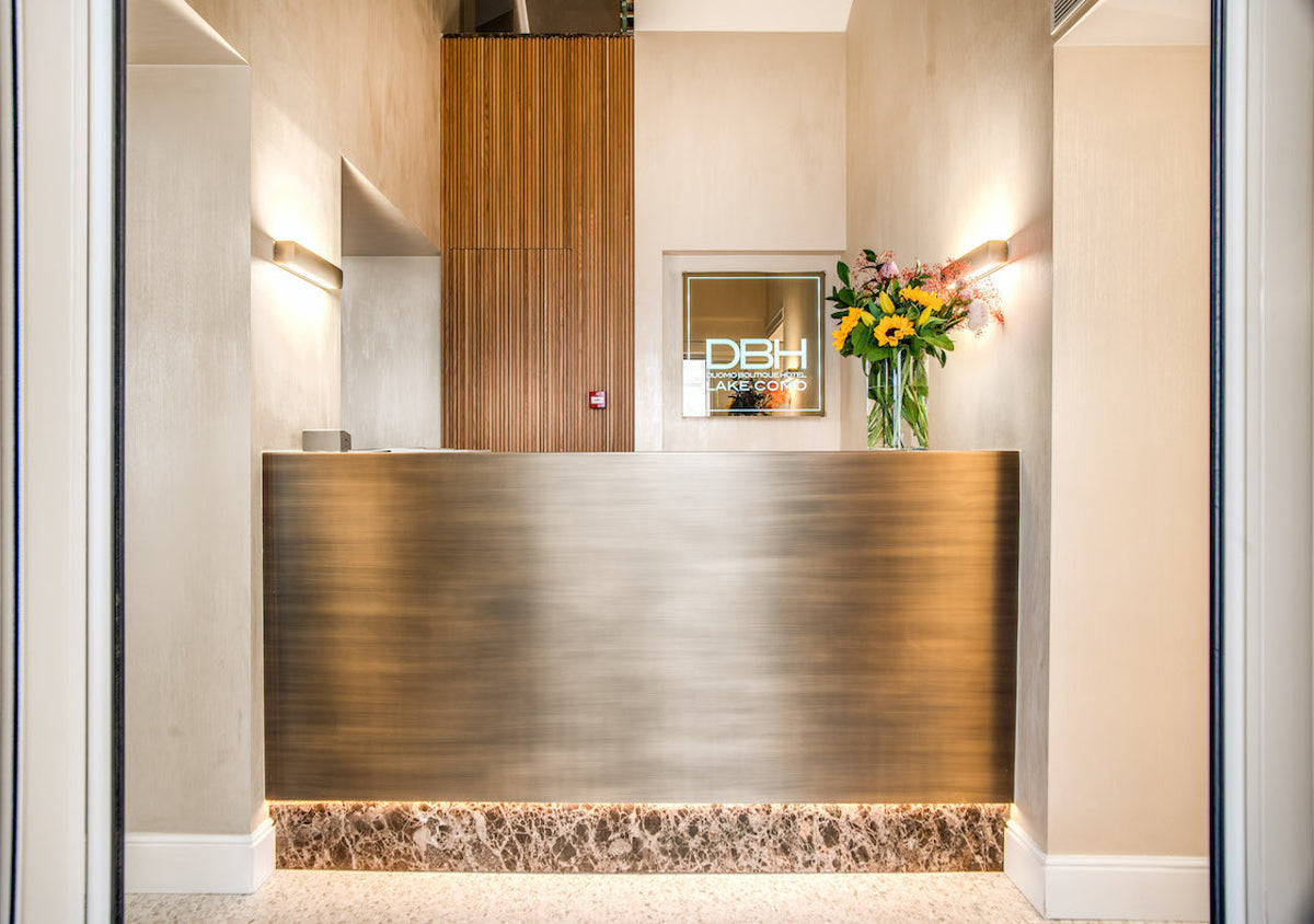 The reception of DBH Duomo Boutique Hotel