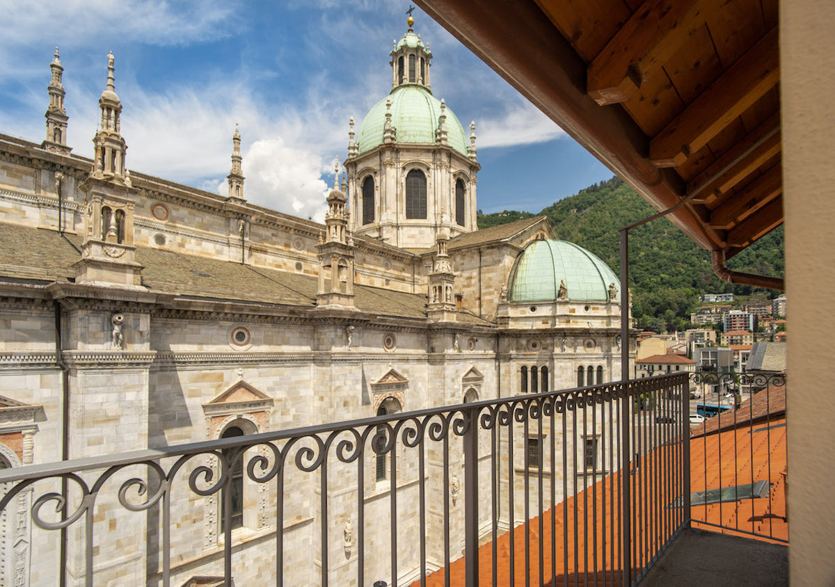 The cathedral dome from a balcony at DBH Duomo Boutique Hotel