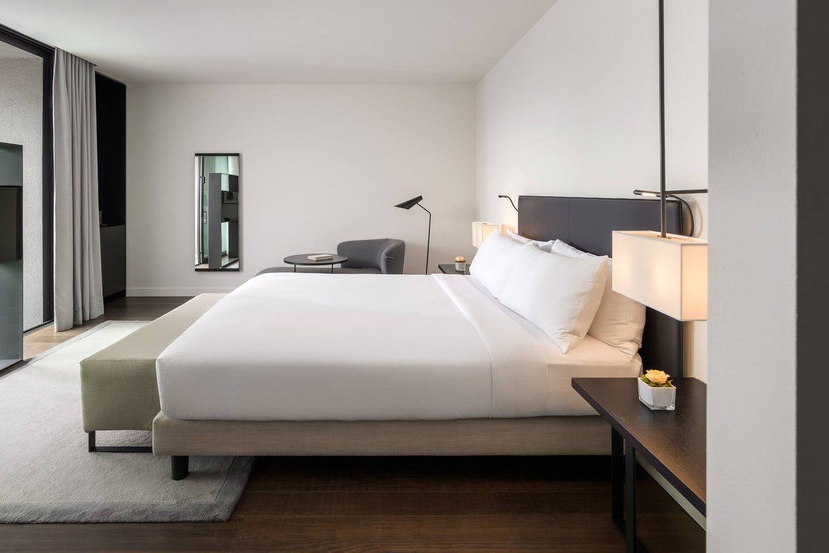 A Deluxe room with balcony at Hilton Lake Como
