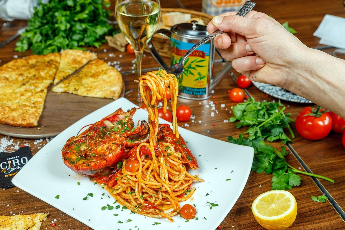 Spaghetti with lobster in tomato sauce at Ciro & Sons