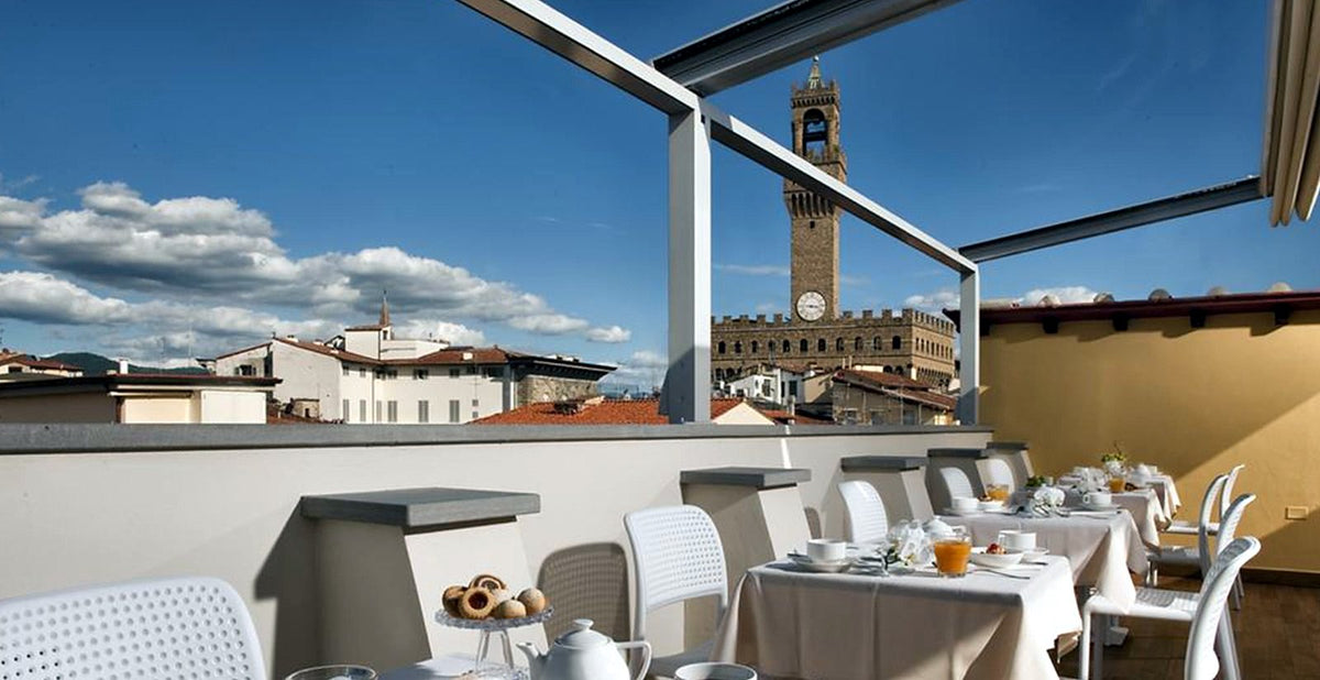 Rooftop breakfast terrace facing Palazzo Vecchio at Hotel della Signoria