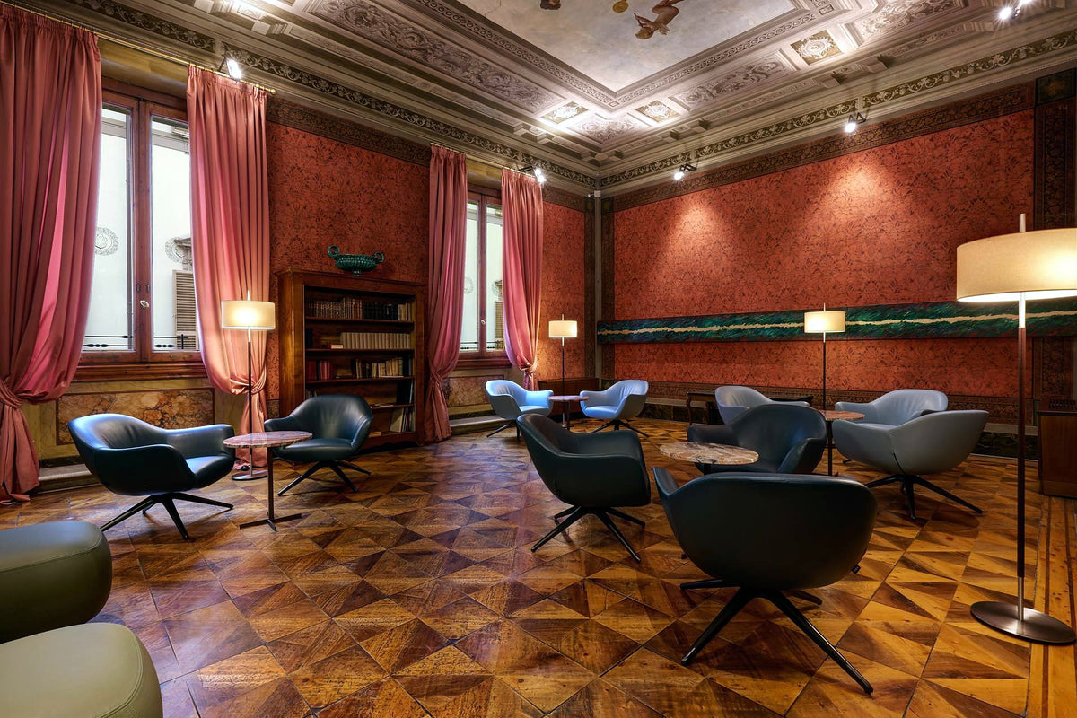 Lounge with frescoed ceiling, red damask walls and inlaid parquet at Orto de' Medici