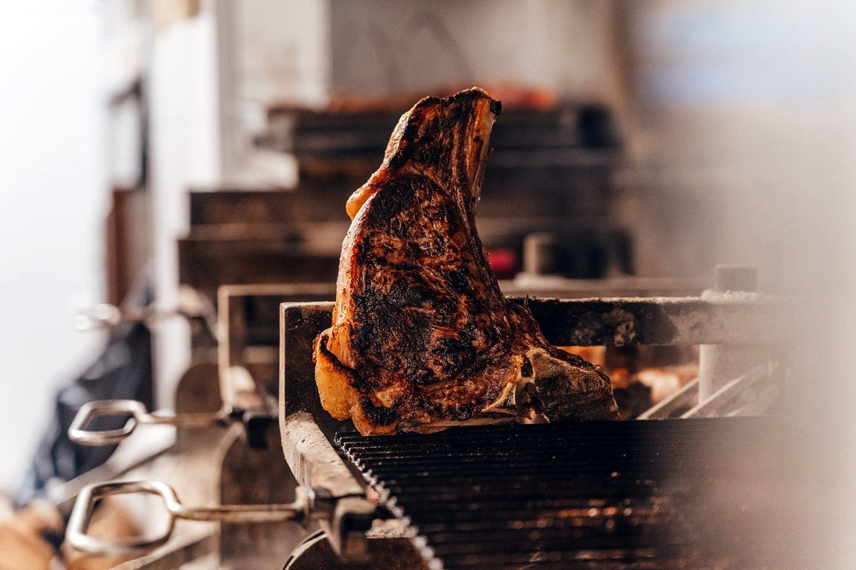Bistecca alla fiorentina on the grill at Il Latini