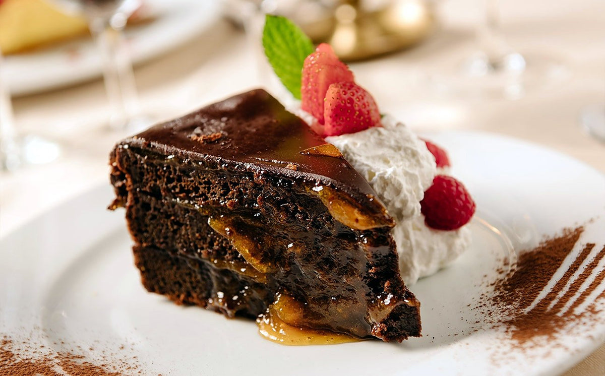 Chocolate cake with cream and raspberries at La Giostra