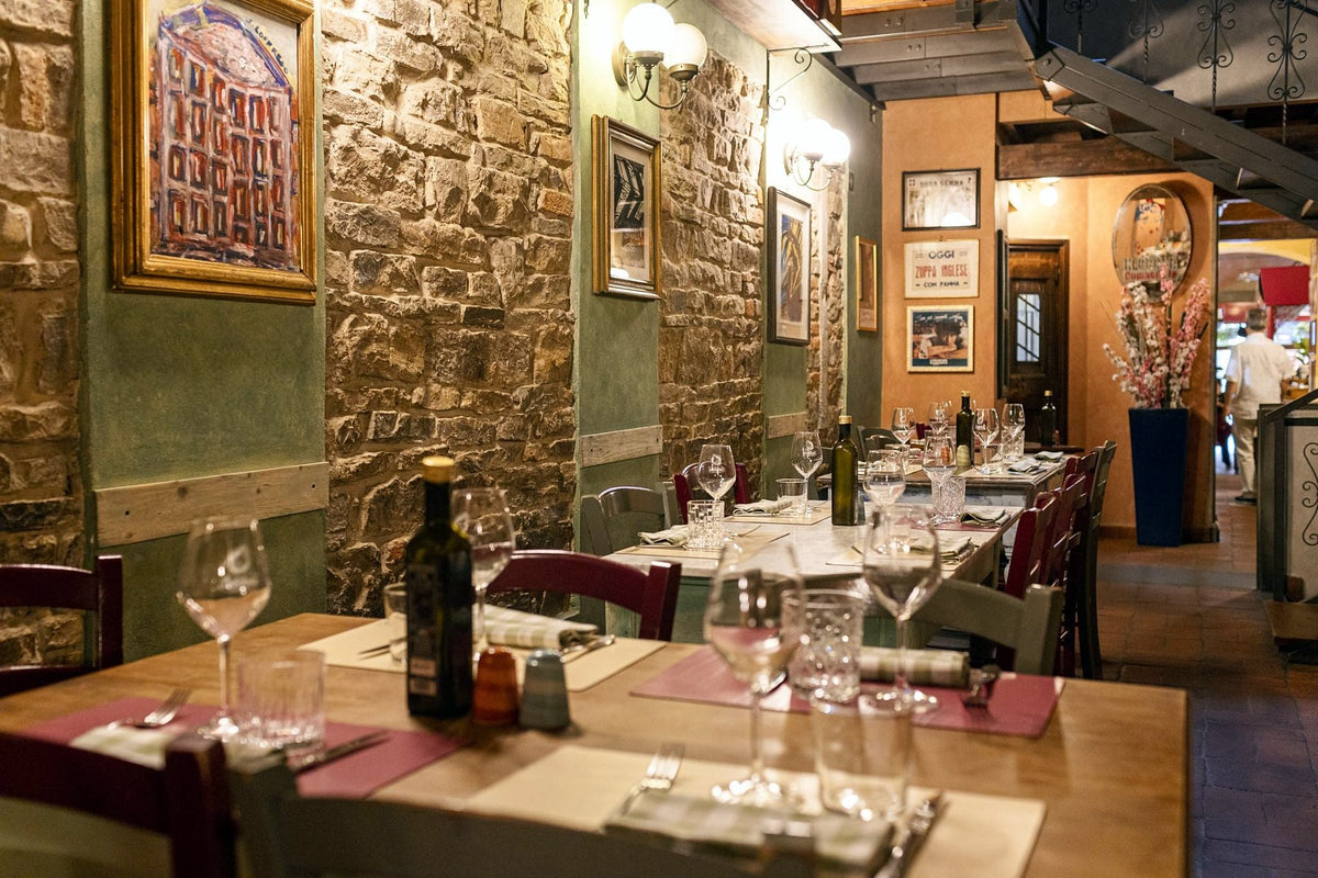Stone-walled dining room at Osteria Cipolla Rossa