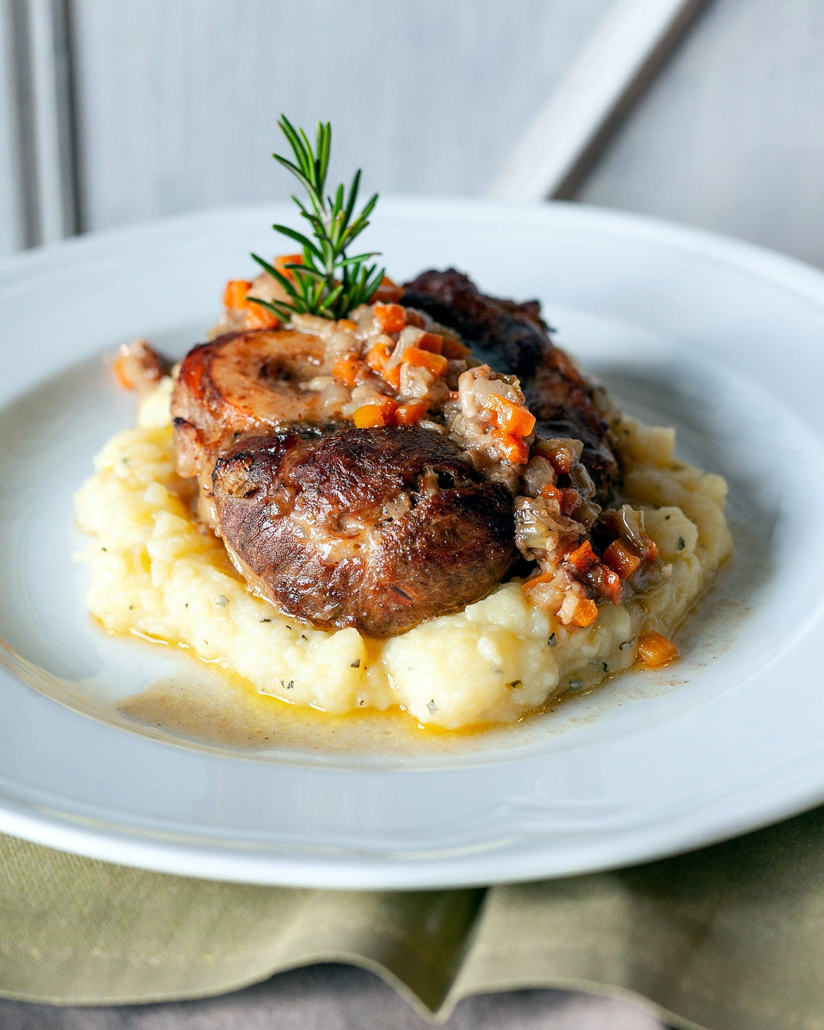 Braised meat on mashed potatoes at Osteria Pratellino