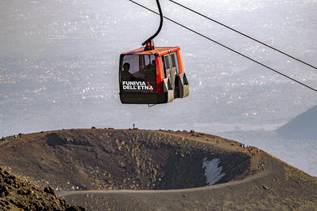 Funivia dell'Etna cable car cabin above a Silvestri crater