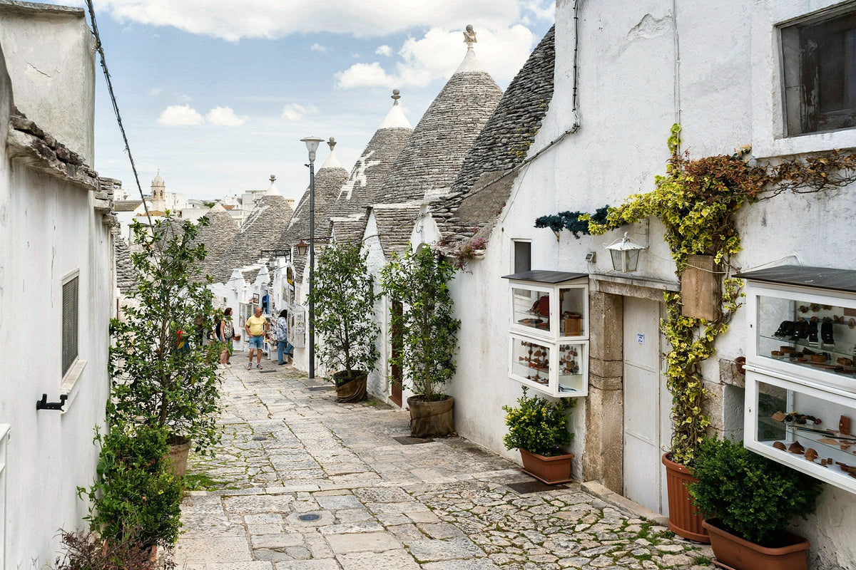 A lane of trulli with conical stone roofs in Alberobello