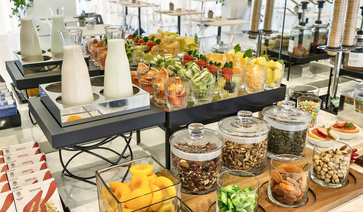 Fresh fruit, juices and cereals on the breakfast buffet at Victor Hotel Bari