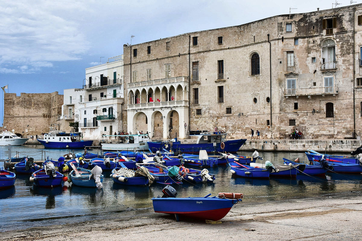 Fishing boats below the palazzi of Monopoli's old harbour