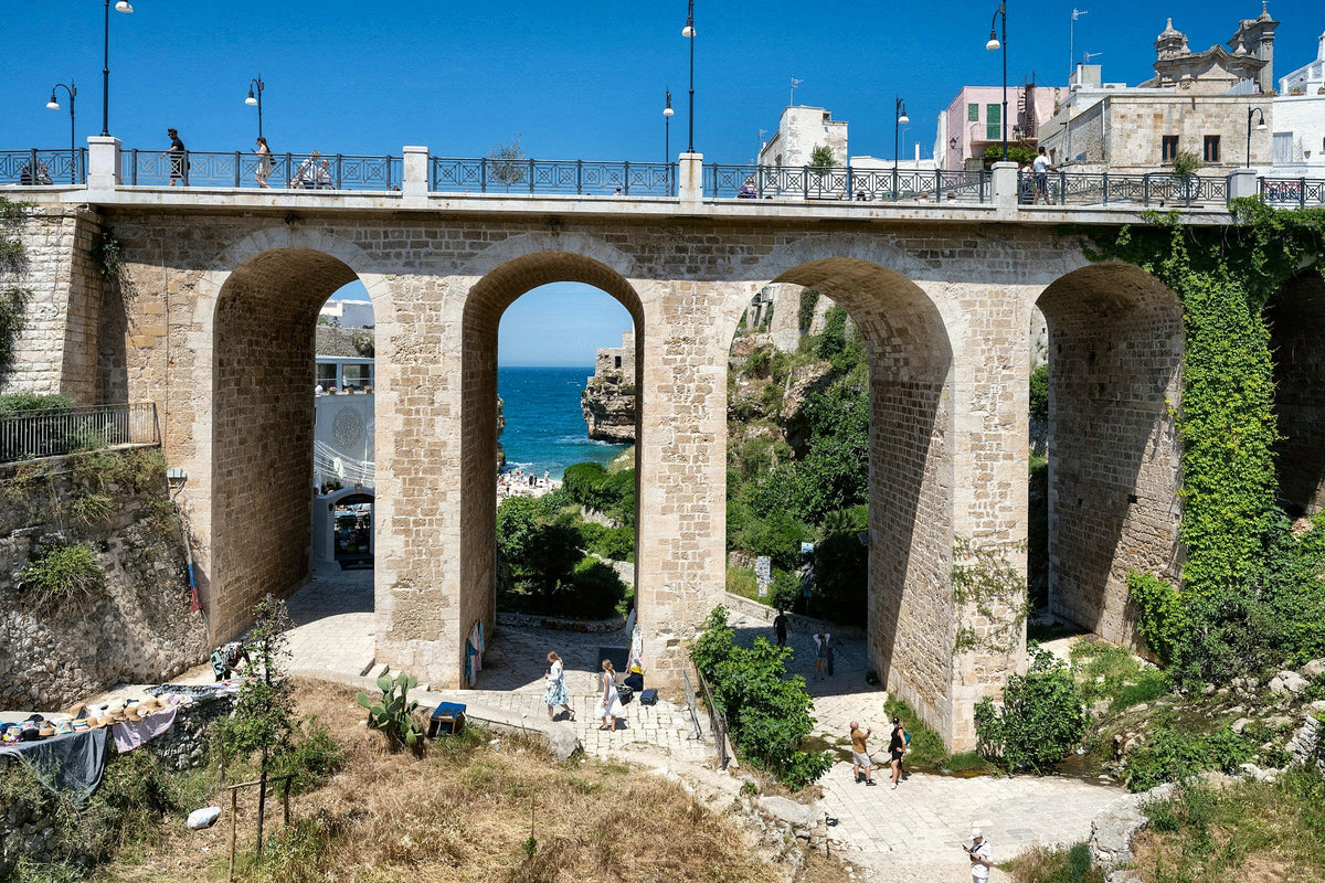 The old arched bridge over Lama Monachile in Polignano a Mare