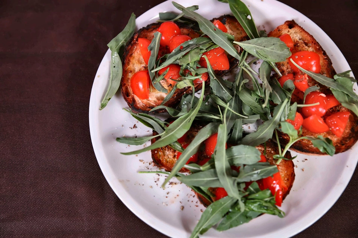 Bruschette with cherry tomatoes and rocket at La Baresana