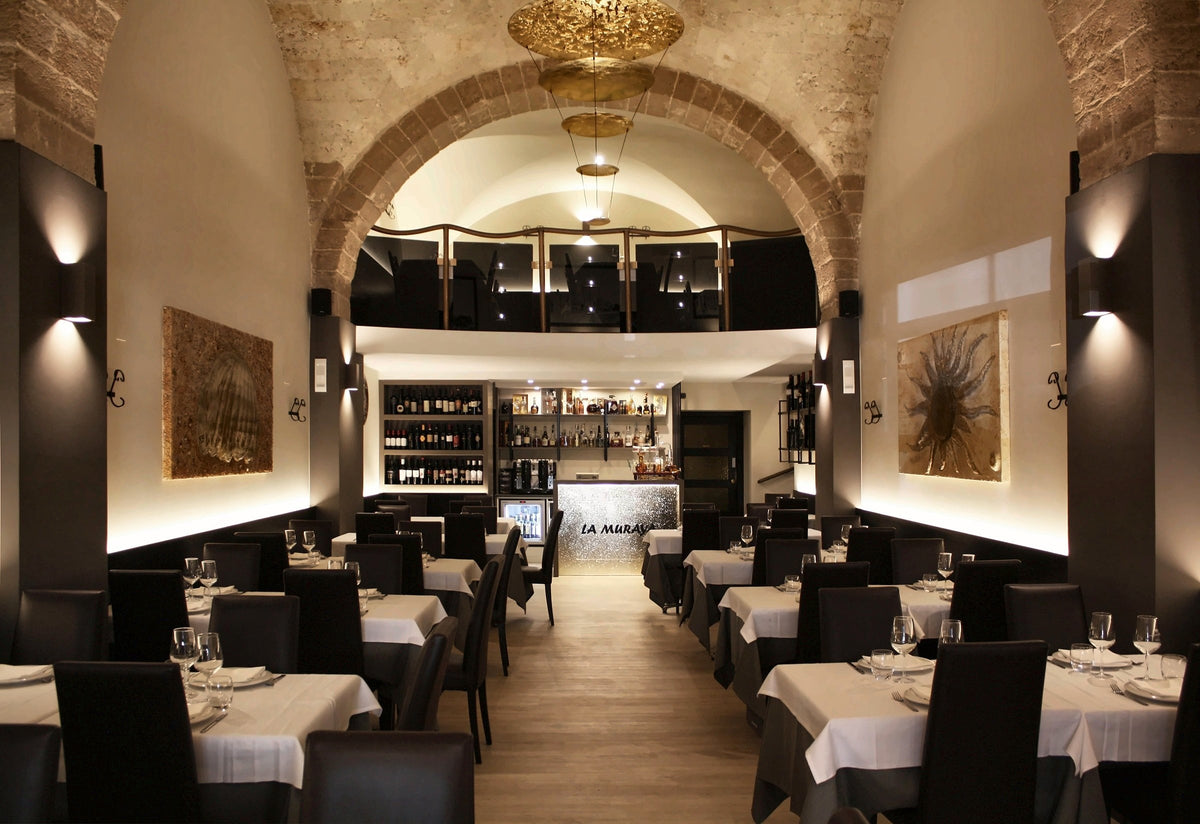 The vaulted stone dining room of La Muraya