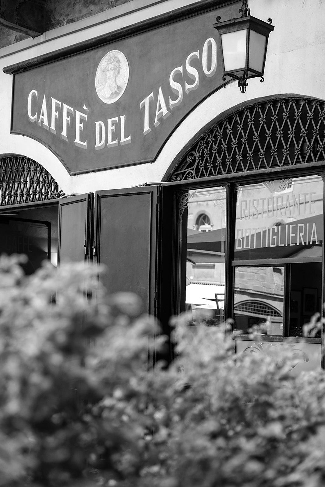 The historic sign of Caffè del Tasso on Piazza Vecchia