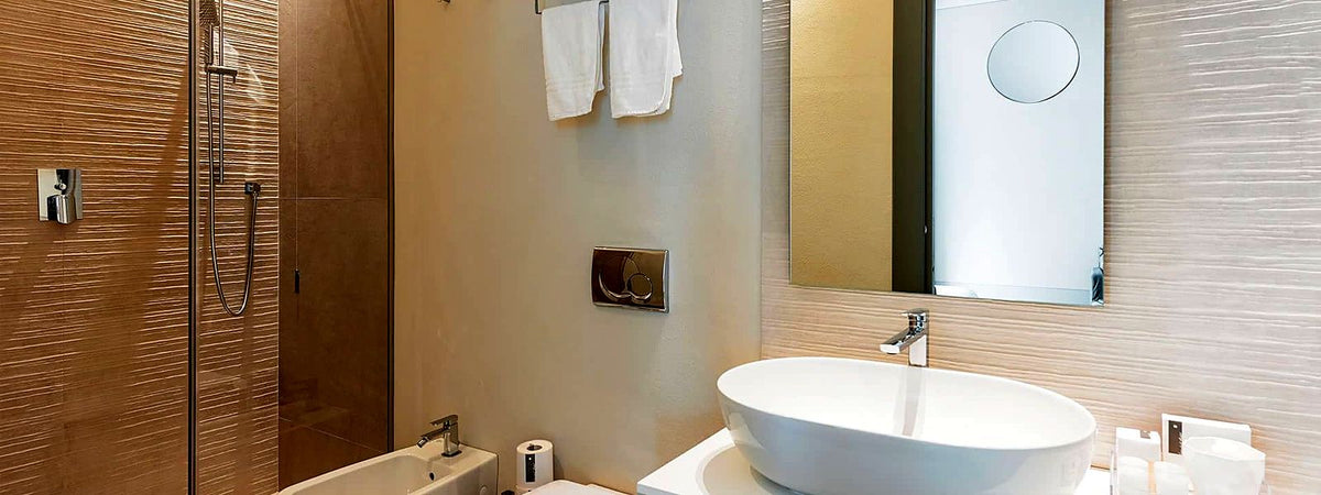 Stone-and-glass bathroom at GombitHotel